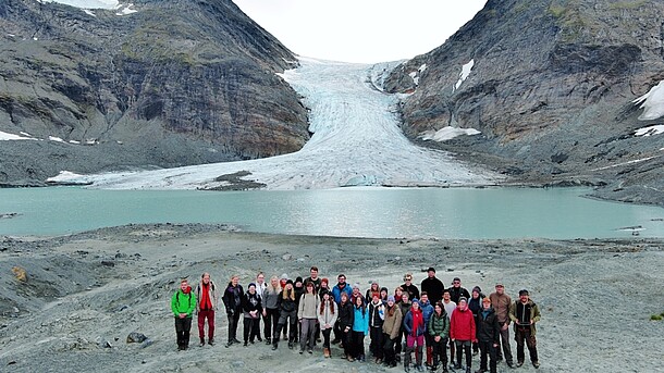 Group in front of a glacier